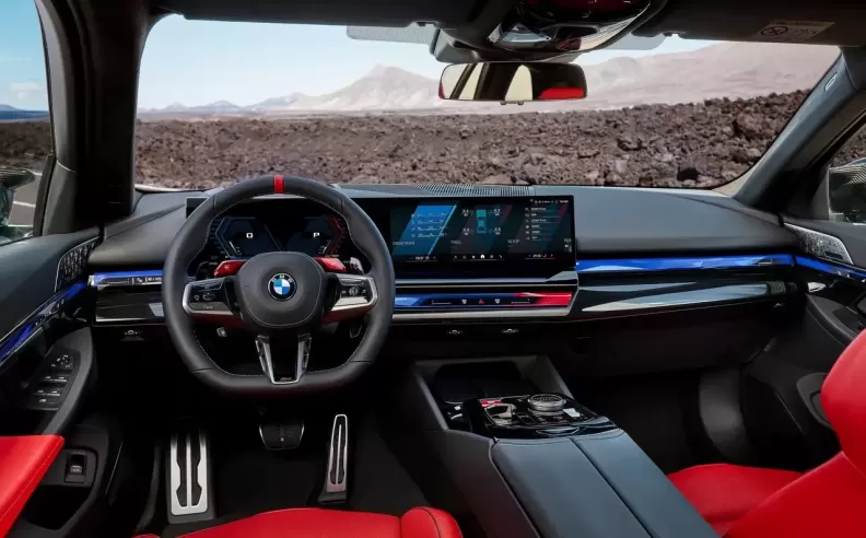 Progressive sports-car cockpit with M-specific displays.