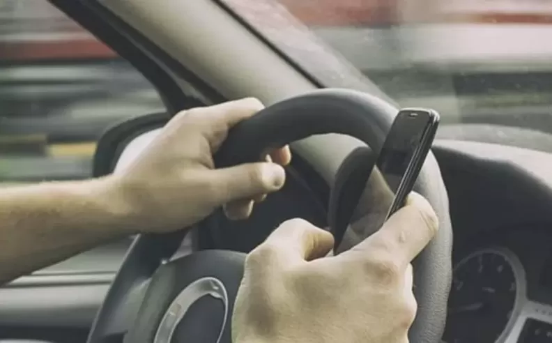 Using a mobile phone while driving 